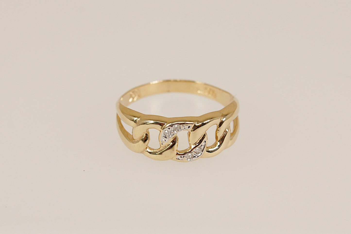 14ct Gold Diamond Knot Design Ring,
A charming and symbolic 14ct gold ring, featuring a graceful triple knot design on the head, with sparkling diamond accents delicately set into the central loop. The split shoulders flow seamlessly into the knot motif, enhancing the fluidity and meaning of the design, Inside the band, the ring is stamped 585, indicating its 14ct gold purity, UK Finger size: N.