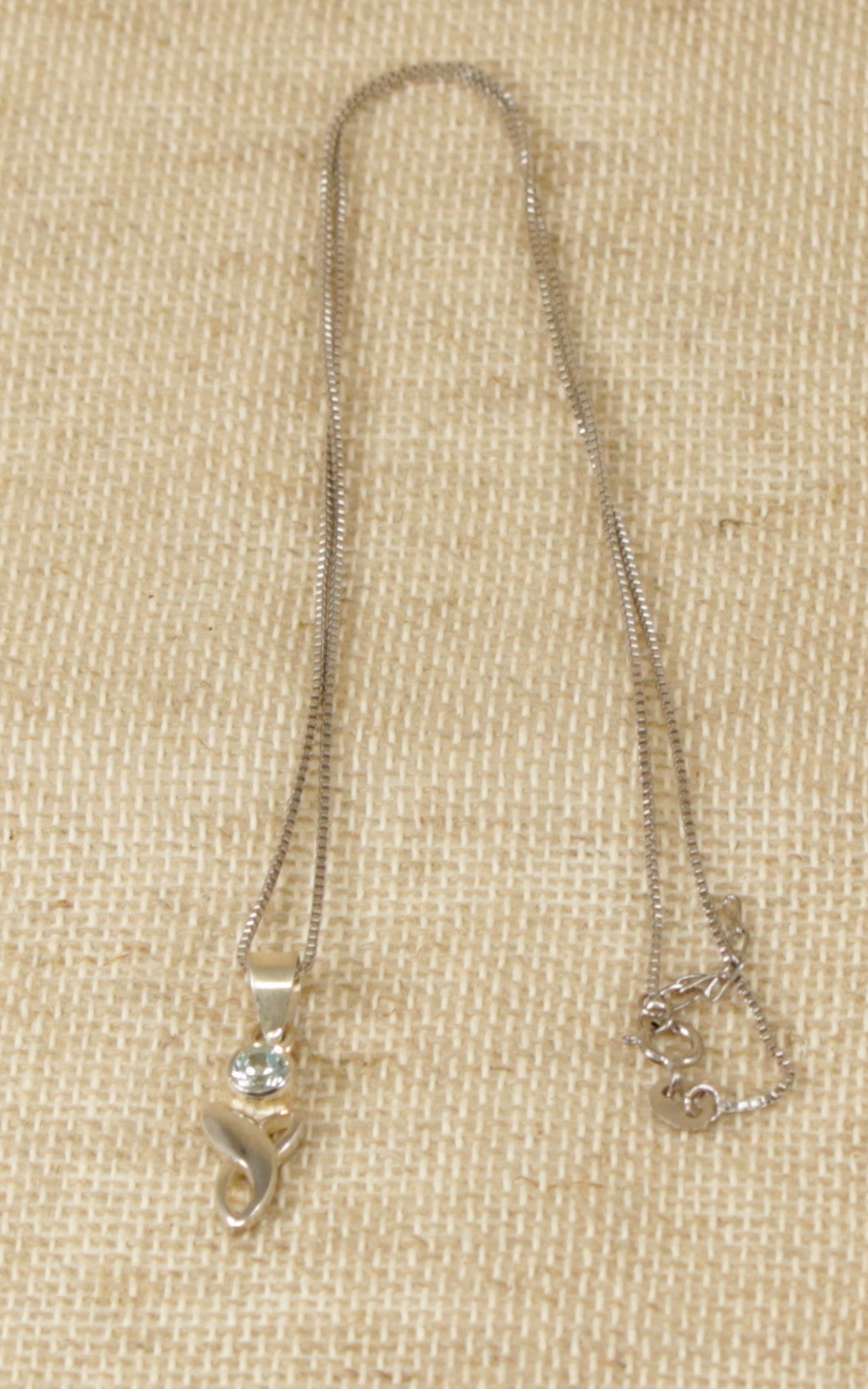 Silver and Topaz Celtic Knot Pendant Necklace