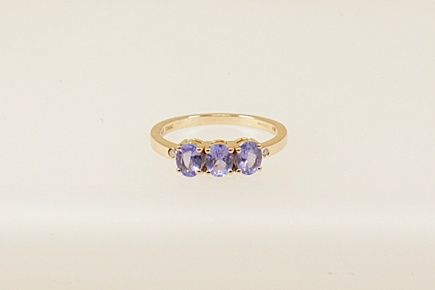 This ring is a stunning and unique piece thanks to the deep, captivating colour of Iolite, Blue Iolite is often referred to as "water sapphire", Each iolite stone is held in a secure 4 claw setting, which allows maximum light to pass through the gems and brings out their full colour and brilliance. UK finger size O.