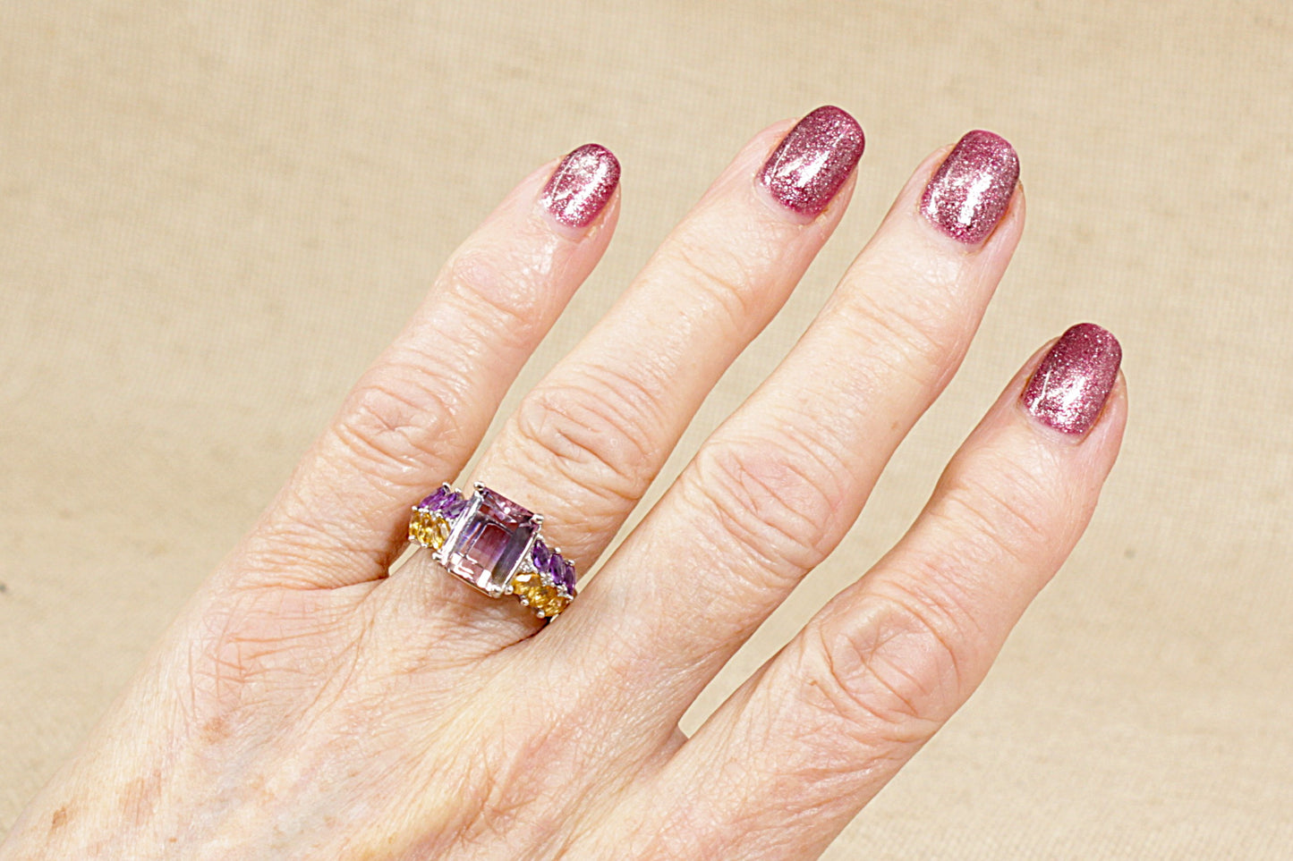 A Silver Amethyst, Citrine and Crystal Statement Ring.