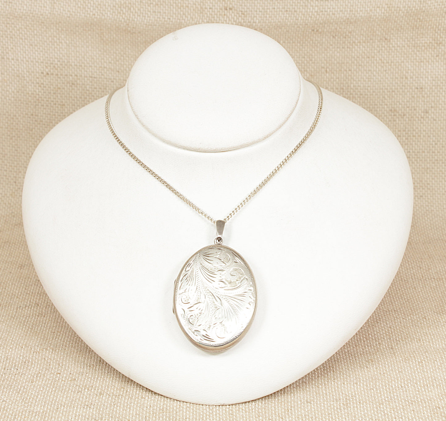 Vintage Large Silver Locket and Chain, A beautifully preserved vintage sterling silver locket, with delicate floral-etched decoration on the front. The reverse bears clear Birmingham hallmarks, confirming its authenticity and silver purity.