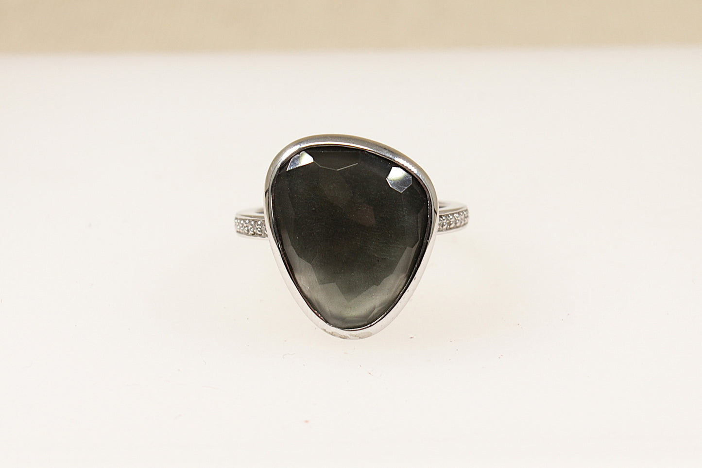 A silver Italian 'Ti Sento' statement ring with a pear-shaped faceted quartz in a bezel setting, displayed against a white background.