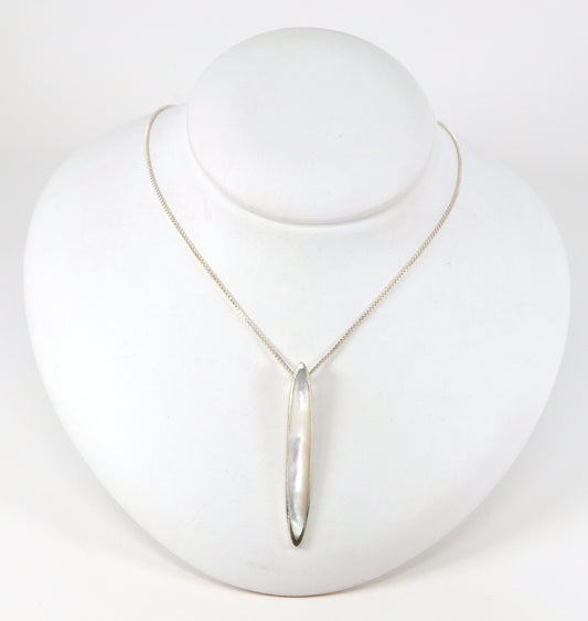 A pretty Silver Mother of Pearl Pendant and Chain. The pendant sits on an 18 inch box chain. The pendant is stamped 925 for sterling silver. The box chain is stamped Italy and 925 for sterling silver.