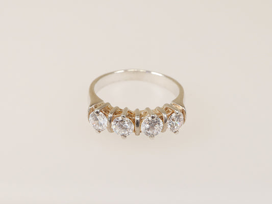 This lovely Sterling Silver ring has 4 claw set Cubic Ziconia gemstones that have all the style and elegance of a real diamond, looks just like the real thing.
The ring is stamped inside the band 925 for sterling silver. UK Finger Size: N .