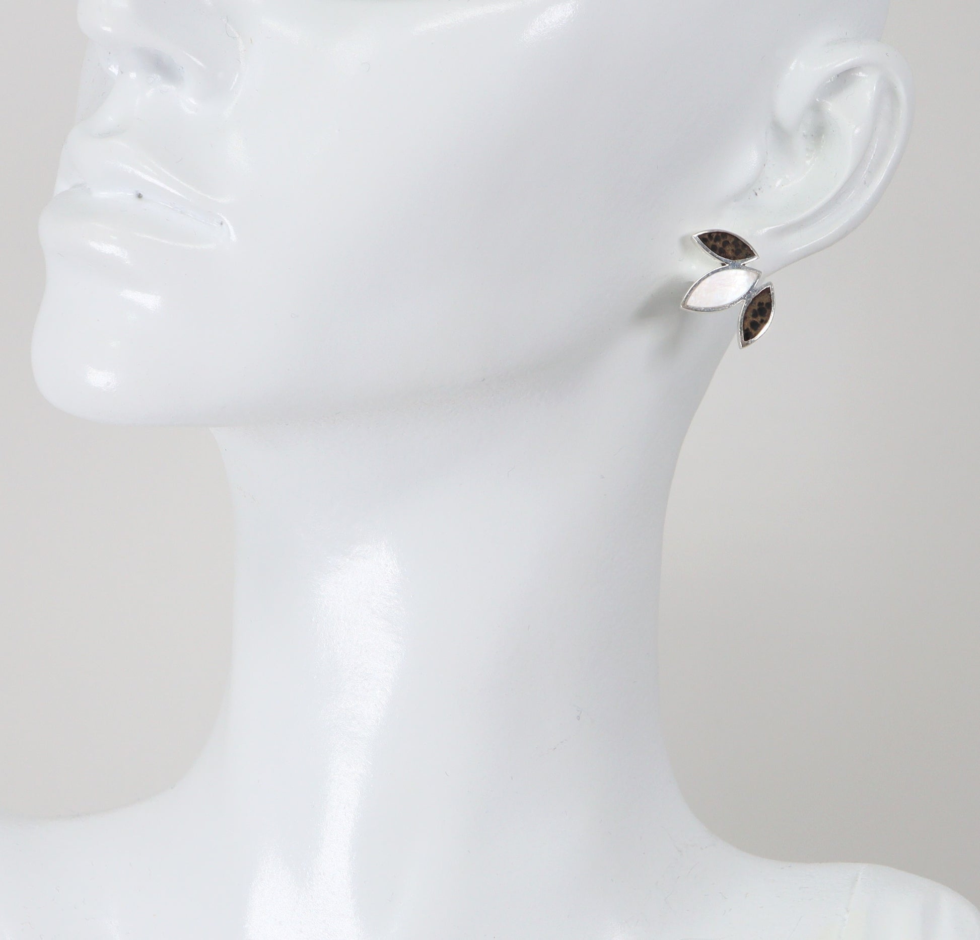 Silver, Mother of Pearl and Leopard Jasper Stud Earrings. These stunning silver stud earrings are in a 3 leaf design, with the central leaf having a piece of MOP and inset in the outer leaves are pieces of Leopard spot Jasper Agate. They are finely made and in excellent condition, and stamped 925 for sterling silver.