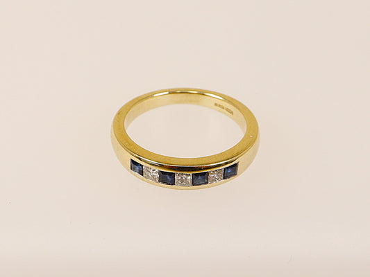 9ct yellow gold blue sapphire and diamond band ring