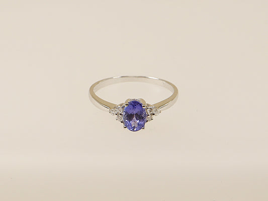 14ct white gold tanzanite and diamond solitaire cluster ring