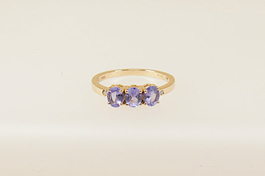 This ring is a stunning and unique piece thanks to the deep, captivating colour of Iolite, Blue Iolite is often referred to as "water sapphire", Each iolite stone is held in a secure 4 claw setting, which allows maximum light to pass through the gems and brings out their full colour and brilliance. UK finger size O.