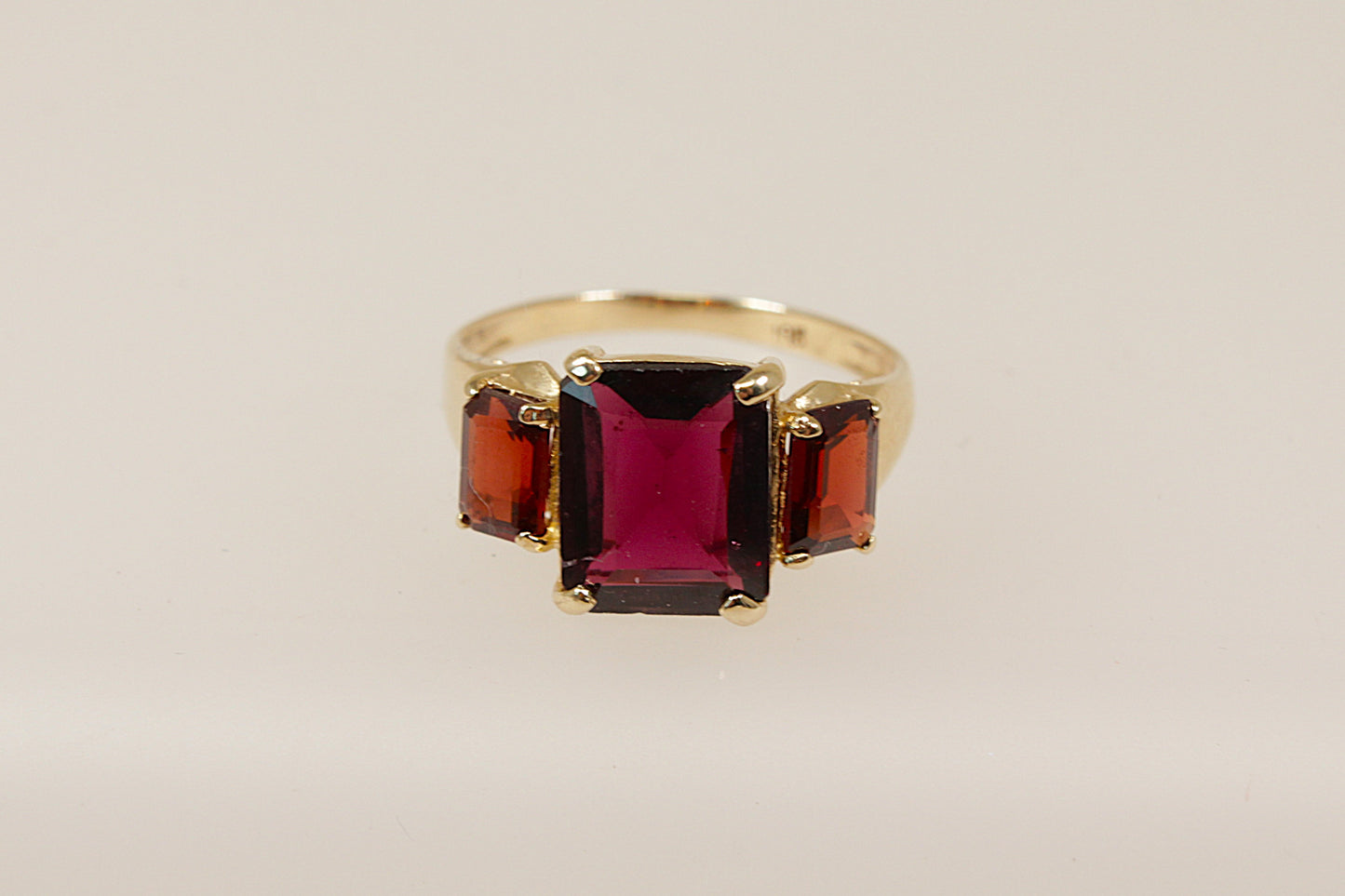 9ct gold almandine garnet trilogy ring