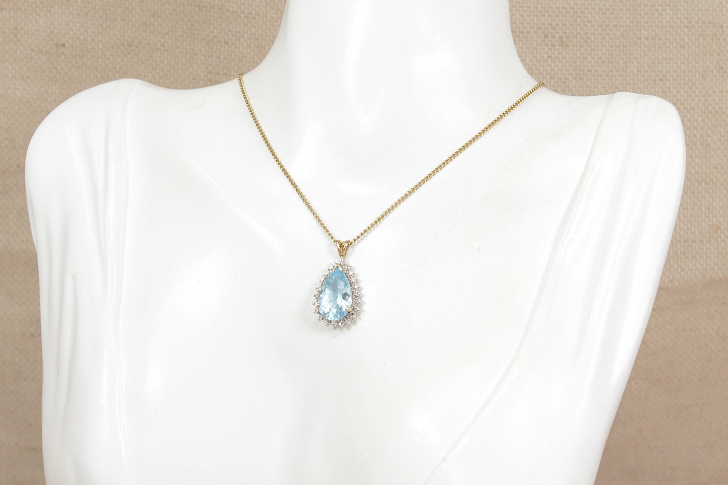 9ct Gold Blue Topaz, Diamond Pendant and Chain Necklace