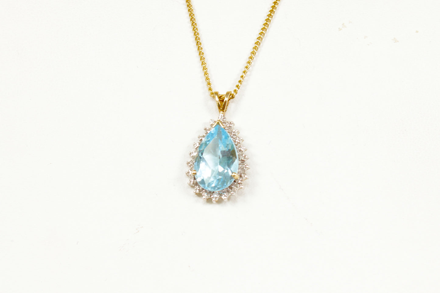 9ct Gold Blue Topaz, Diamond Pendant and Chain Necklace
