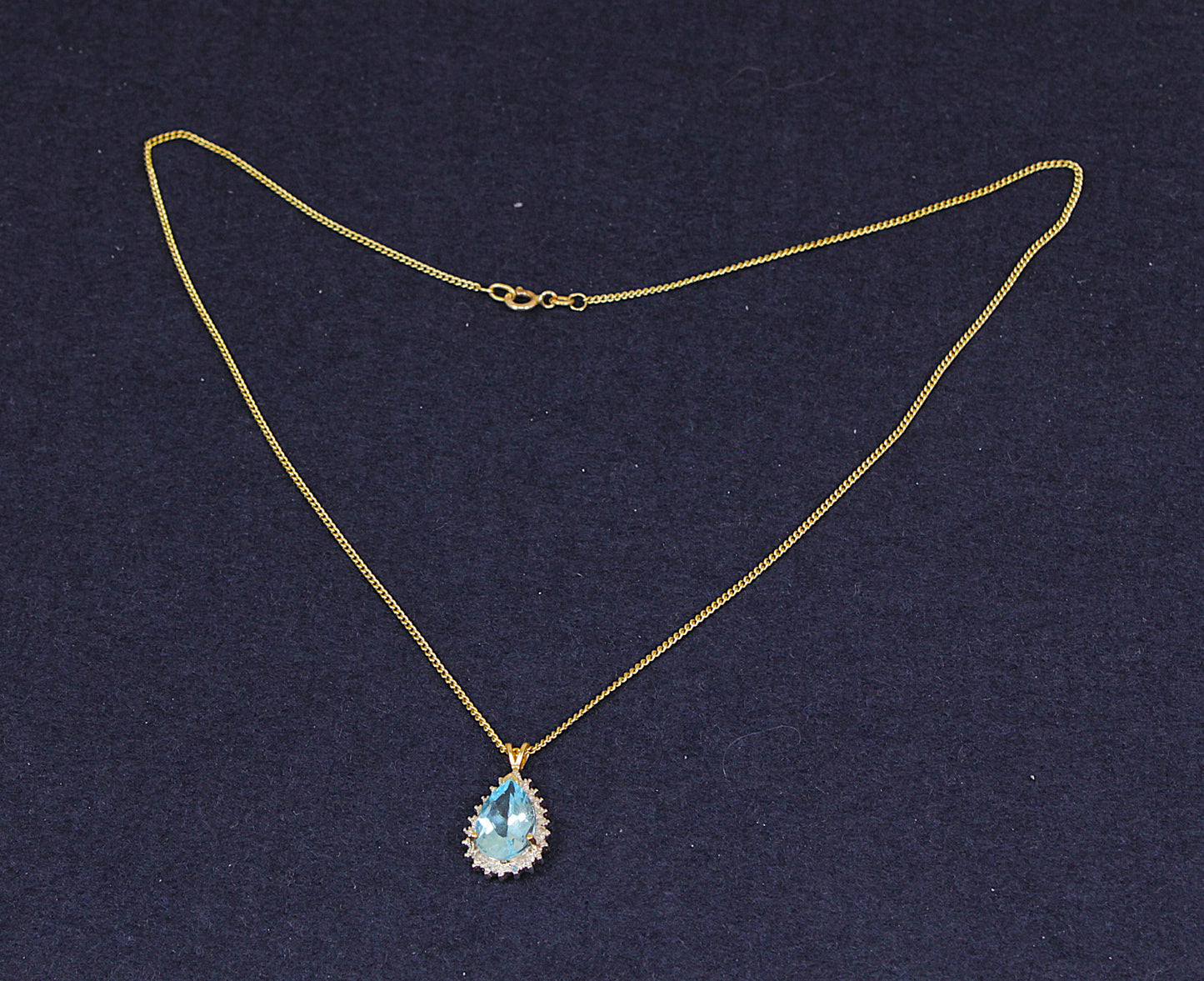 9ct Gold Blue Topaz, Diamond Pendant and Chain Necklace
