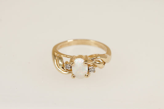9ct yellow gold fire opal and diamond ring size N.