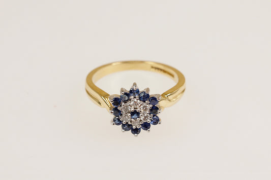 18ct yellow gold sapphire and diamond cluster flower ring.