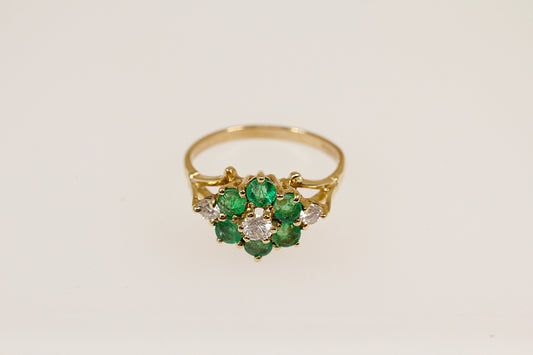 9ct yellow gold emerald and diamond cluster flower ring.