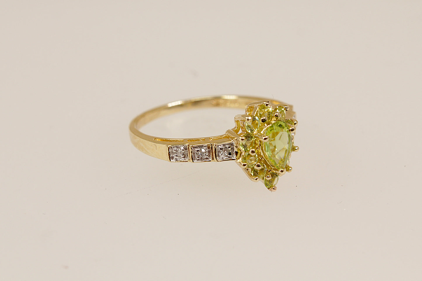 Peridot and Diamond Halo Gold Ring