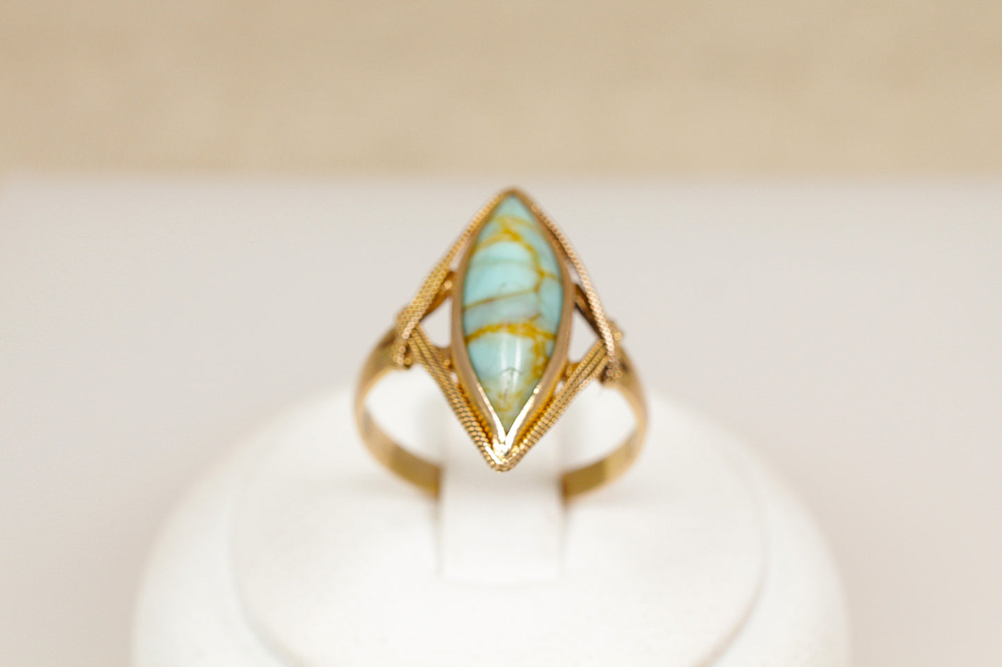 An 18ct yellow gold Art Deco genuine turquoise navette ring made with the richness of 18ct yellow gold, UK finger size O.