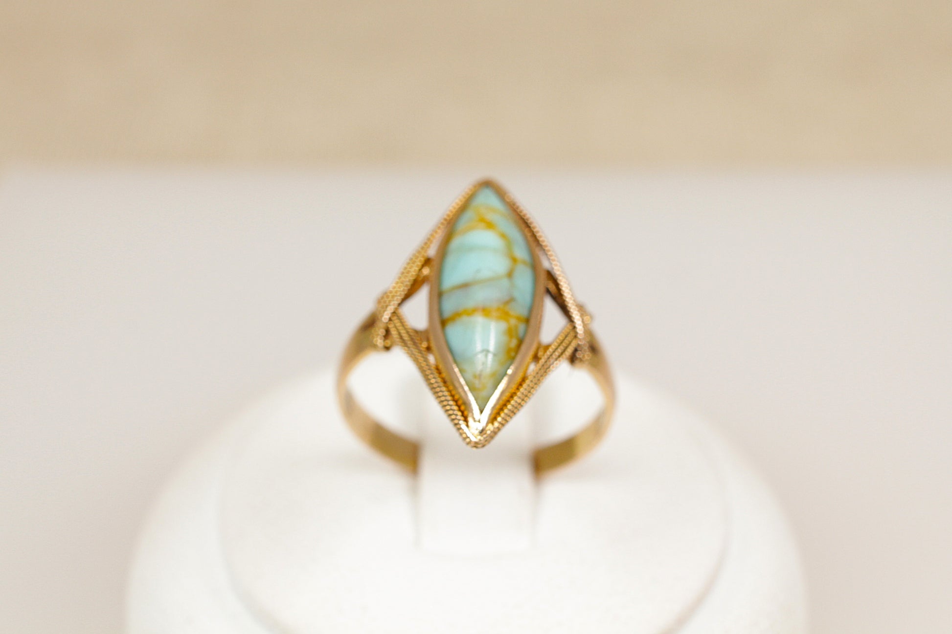 An 18ct yellow gold Art Deco genuine turquoise navette ring made with the richness of 18ct yellow gold, UK finger size O.