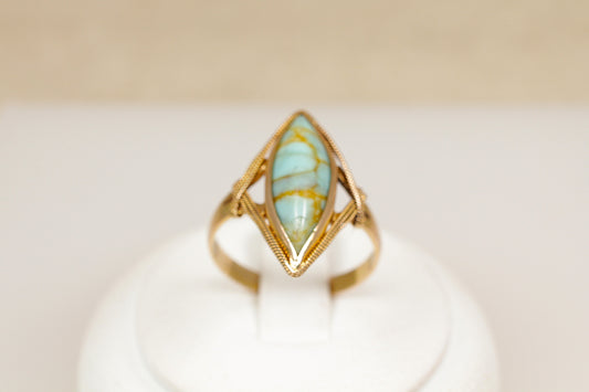 An 18ct yellow gold Art Deco genuine turquoise navette ring made with the richness of 18ct yellow gold, UK finger size O.