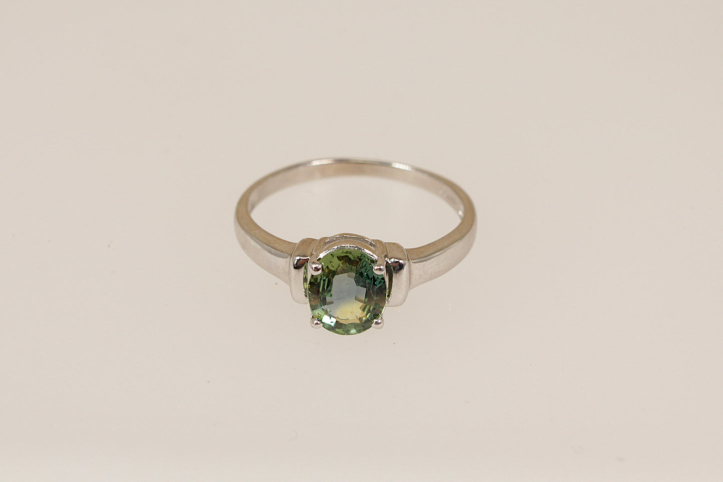 9ct White Gold and Green Sapphire Solitaire Ring