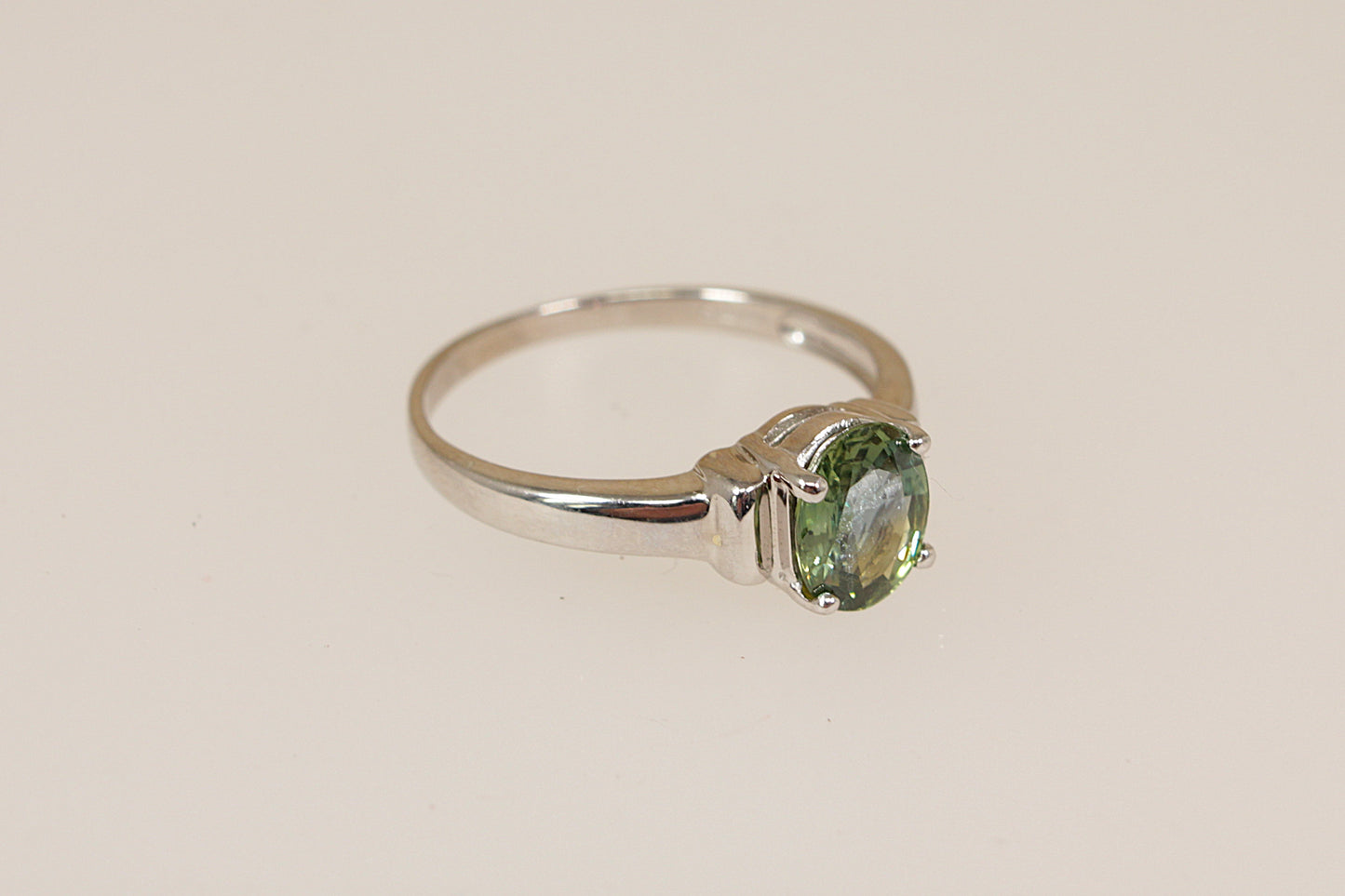 9ct White Gold and Green Sapphire Solitaire Ring