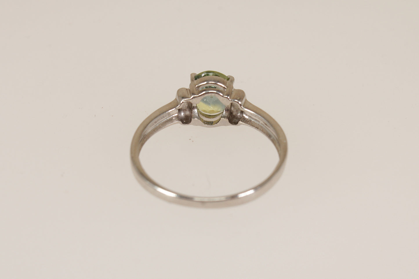 9ct White Gold and Green Sapphire Solitaire Ring