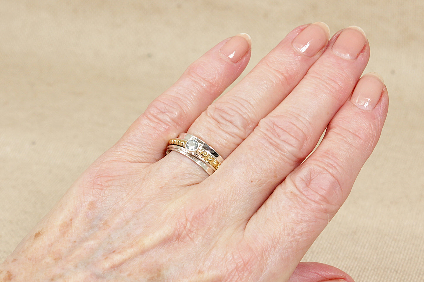 Silver and Blue Topaz Spinner Ring