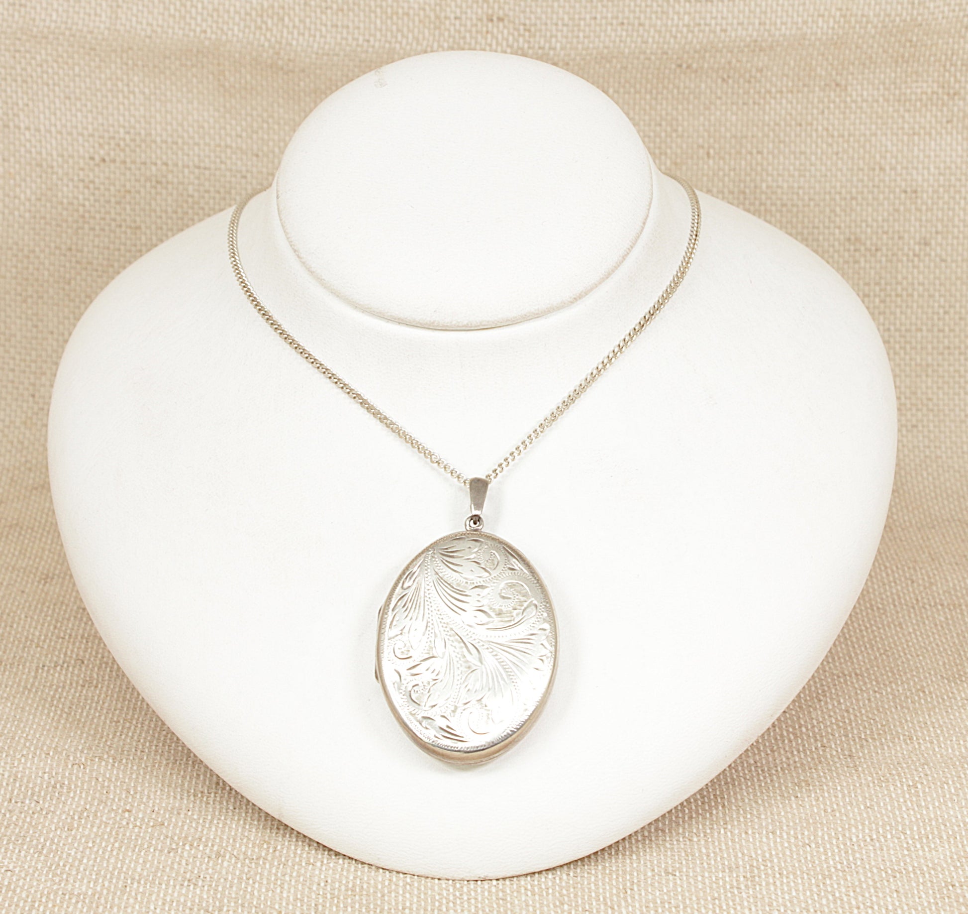 Vintage Large Silver Locket and Chain, A beautifully preserved vintage sterling silver locket, with delicate floral-etched decoration on the front. The reverse bears clear Birmingham hallmarks, confirming its authenticity and silver purity.