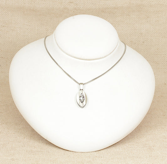 A superb Silver Scandinavian designer Pendant Necklace with a marquis cut Citrine gemstone by Finnfeelings of Finland the pendant has a brushed finish with a bark effect border and sits on an adjustable 16 to 18 inch silver curb link chain, this item matches stud earrings 4319.