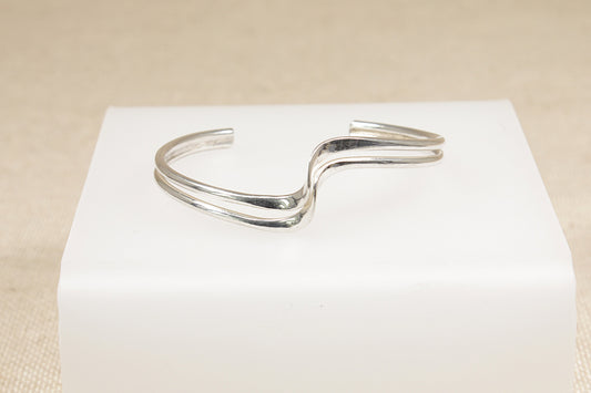 Sterling silver torque bracelet bangle stamped 925 for silver purity of 92.5% pure silver.