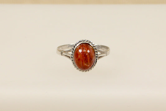 This pretty vintage silver ring has an oval Goldstone gemstone set in handcrafted silver. It is in excellent condition and inside the band it is stamped Silver. Head size: 13 x 11mm
UK Finger Size: V.
