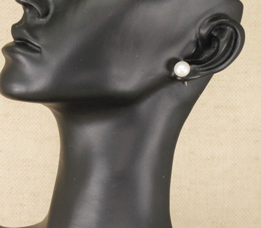These pretty faux Pearl stud earrings are a timeless classic and in excellent condition. They are stamped 925 for sterling silver. Pearl: 8mm Diameter