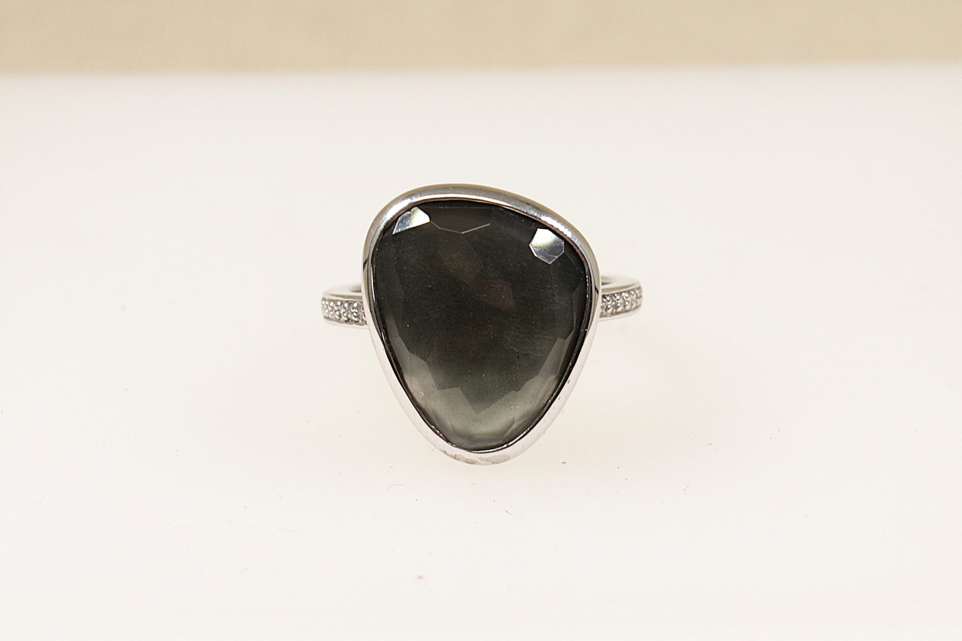 A silver Italian 'Ti Sento' statement ring with a pear-shaped faceted quartz in a bezel setting, displayed against a white background.
