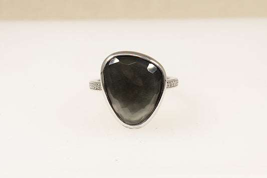A silver Italian 'Ti Sento' statement ring with a pear-shaped faceted quartz in a bezel setting, displayed against a white background.