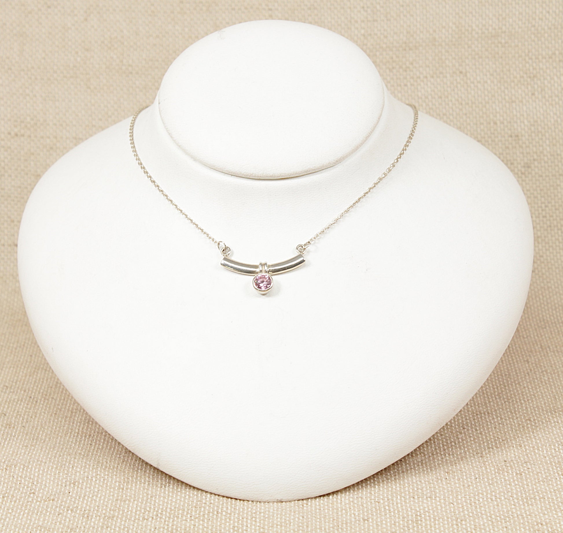 A sterling silver gemstone set necklet by the renowned maker Kit Heath, the necklet is stamped 925 KH the length is adjustable from sixteen inches to 17 inches.