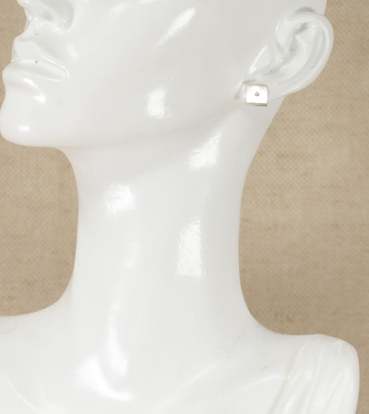 These pretty earrings are square in shape and have a clear crystal in the centre. They are in excellent condition and stamped 925 for sterling silver.
