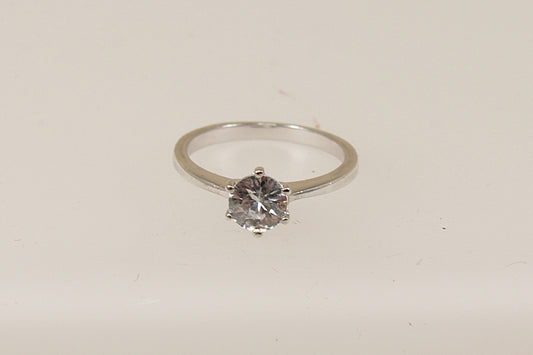 A sterling silver white topaz solitaire ring, Stamped 925 for sterling silver and the makers mark ‘TGGC’ for The Genuine Gemstone Company, UK finger size O.